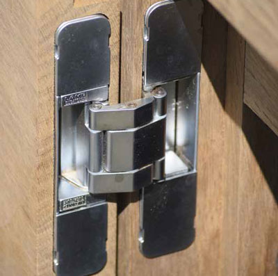 The HES3D-120, an architectural style concealed hinge for cabinet doors.