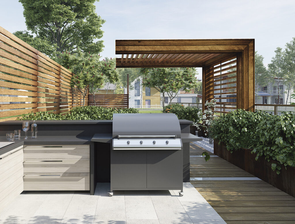 Modern outdoor kitchen with gas grill on a wooden patio. 3D rendering of a backyard barbecue area